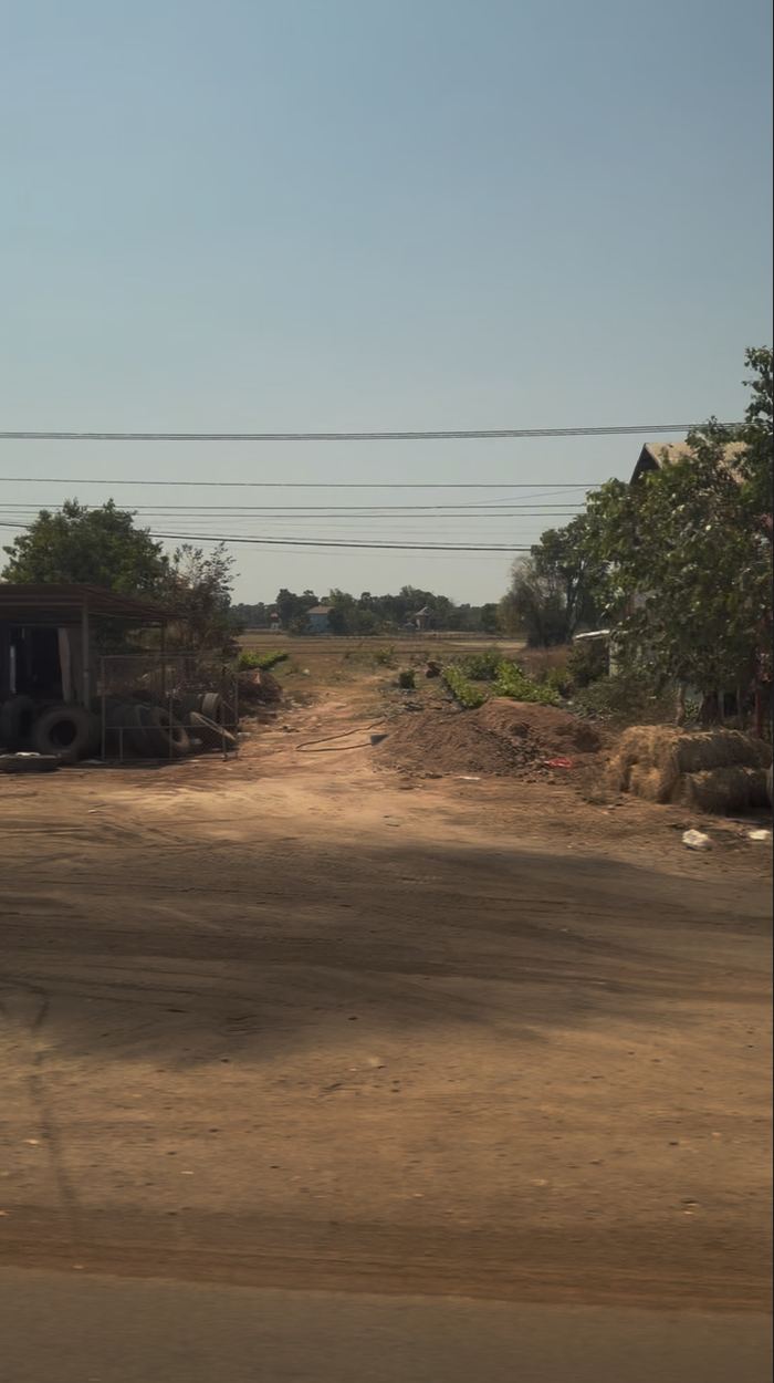 A dusty road through the countryside