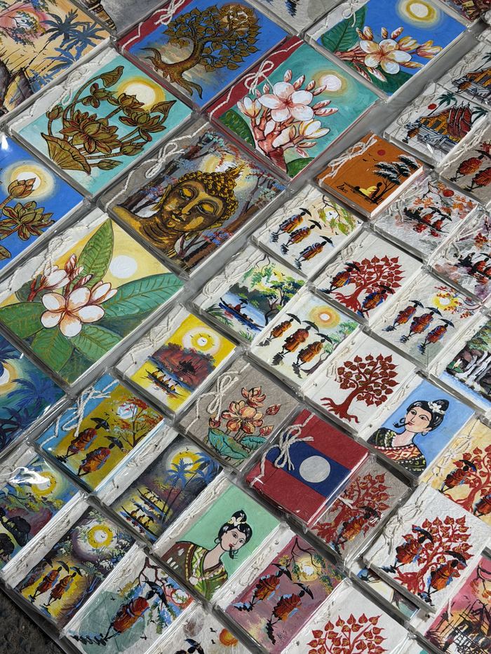 Hand-painted cards laid out at the night market