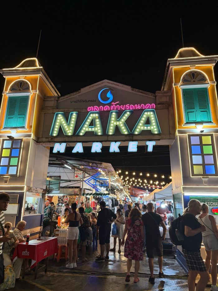 The lit-up entrance to Naka Weekend Market
