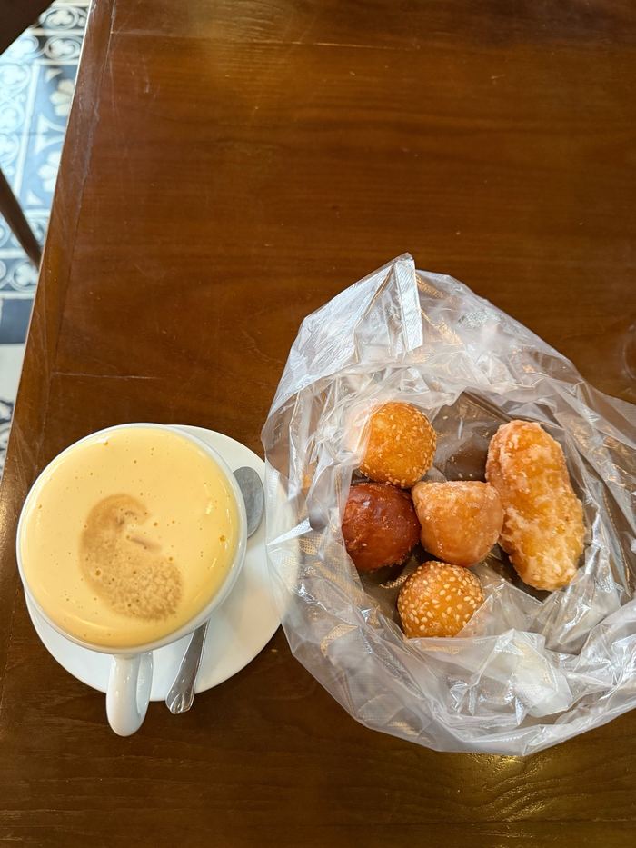 Egg coffee and a bag of fried donuts