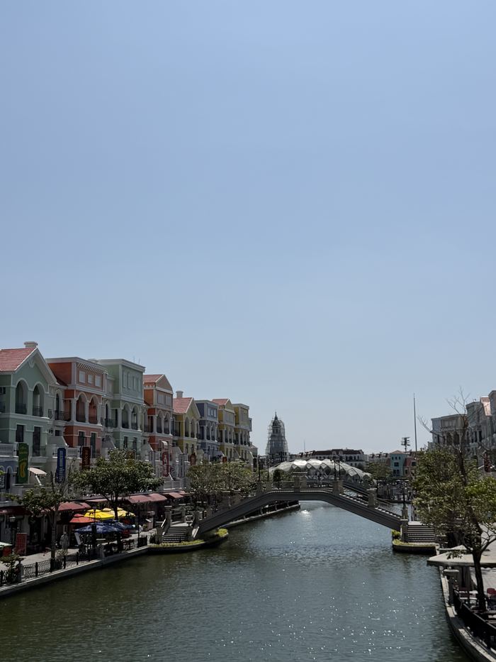 Pastel buildings along a canal at Grand World